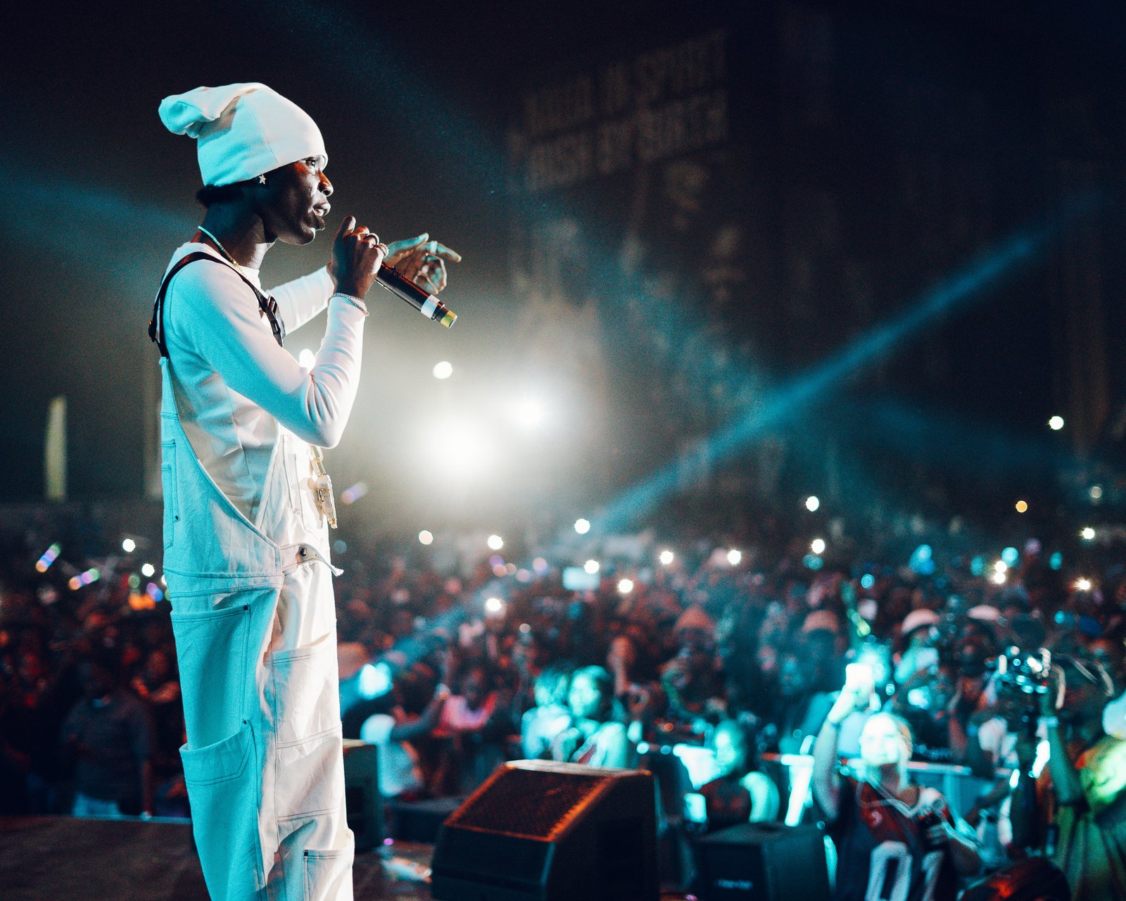 A performer on stage at a Halloween-themed Motherland show